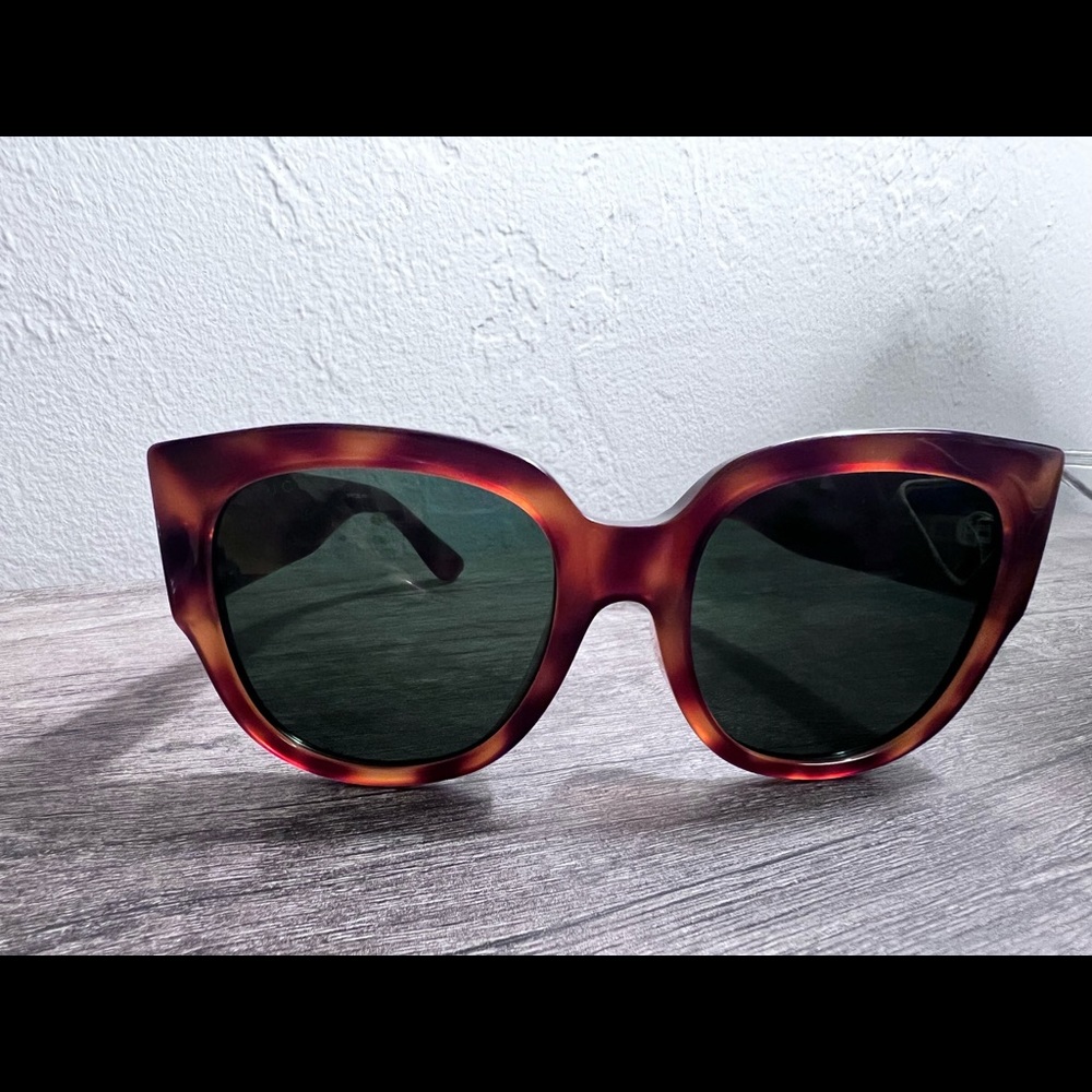 Brand new sunglasses, I wore it once. Too big for my face.